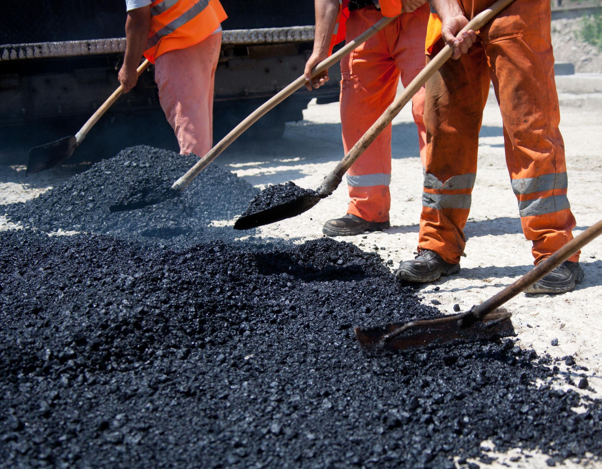 Road work asphalt & bitumen paving
